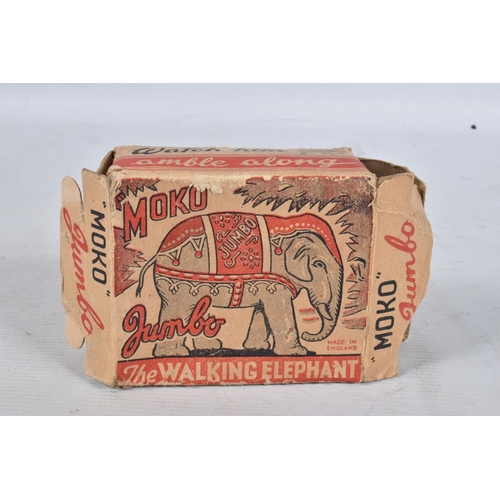 98 - A BOXED MOKO JUMBO THE WALKING ELEPHANT WIND UP TIN PLATE TOY, grey body with a decorative faded red... 