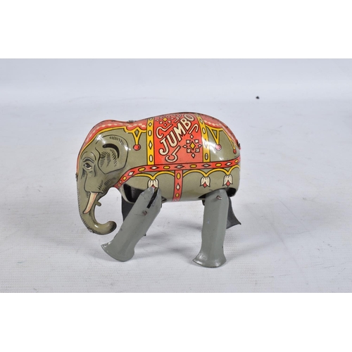 98 - A BOXED MOKO JUMBO THE WALKING ELEPHANT WIND UP TIN PLATE TOY, grey body with a decorative faded red... 