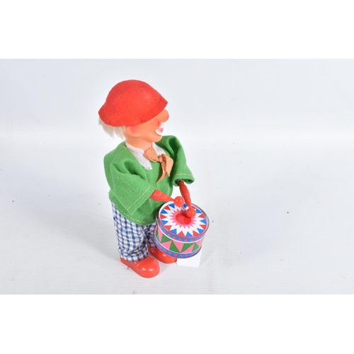 116 - A BOXED YONEZAWA BATTERY OPERATED TINPLATE BALLOON VENDOR, not tested, tinplate base with dressed fi... 