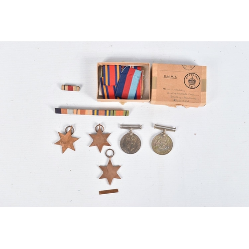 330 - A BOXED SET OF WWII MEDALS AND WWII ERA HAT AND OTHER ITEMS, this lot contains a kit bag, 1944 dated... 