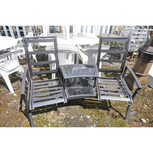 1003 - AN ALUMINIUM BISTRO TABLE, diameter 60cm x height 72cm, four armchairs, along with a metal curved be... 