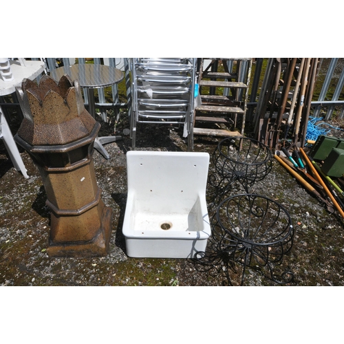 1004 - A TREACLE GLAZED OCTAGONAL CHIMNEY POT, diameter 38cm x height 100cm, along with a wall mounted Belf... 