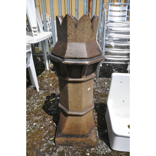 1004 - A TREACLE GLAZED OCTAGONAL CHIMNEY POT, diameter 38cm x height 100cm, along with a wall mounted Belf... 
