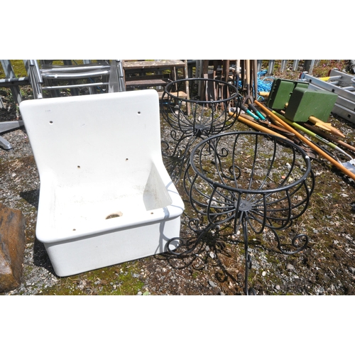 1004 - A TREACLE GLAZED OCTAGONAL CHIMNEY POT, diameter 38cm x height 100cm, along with a wall mounted Belf... 