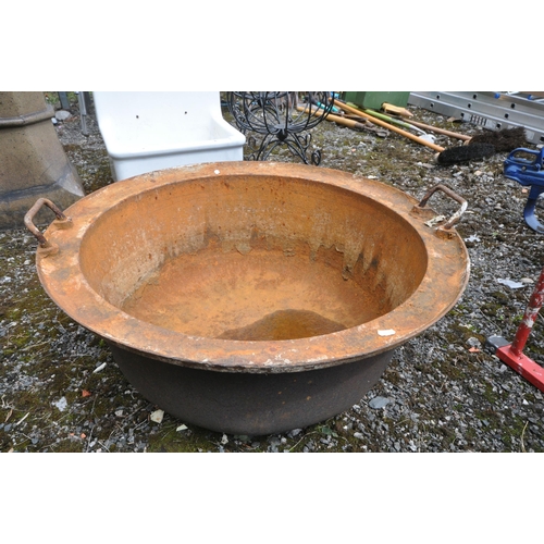 1007 - A VINTAGE CAST IRON TWIN HANDLED BASIN/BOWL, diameter 77cm x height 33cm
