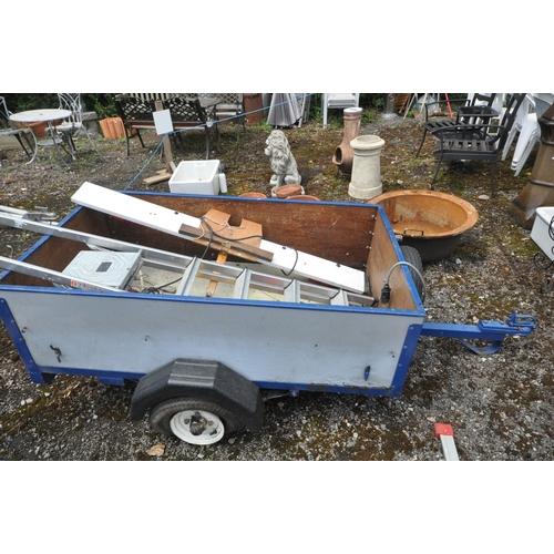 1011 - A SINGLE AXLE BOX TRAILER, with tail boards and cables, along with an aluminium step ladder (conditi... 