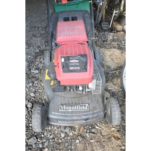 1012 - A MOUNTFIELD HP470 PETROL LAWNMOWER, with grass box (engine turns)