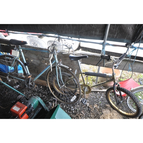 1014 - A PEUGEOT PALE BLUE GENTS BICYCLE, and a Raleigh super burner gold child's bike (condition report: -... 