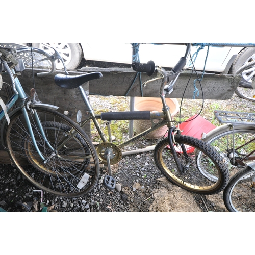 1014 - A PEUGEOT PALE BLUE GENTS BICYCLE, and a Raleigh super burner gold child's bike (condition report: -... 