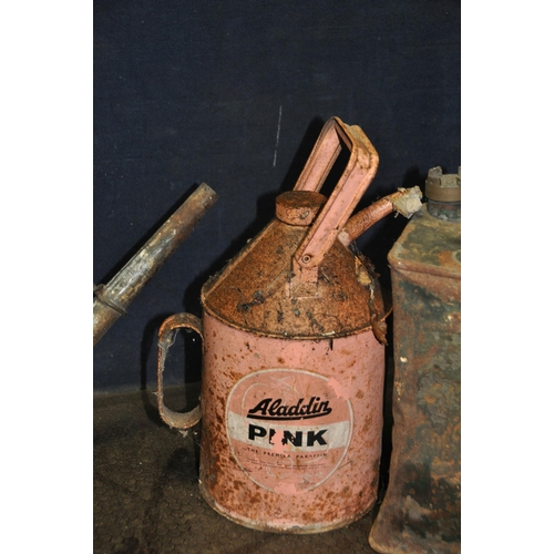 1051 - A COLLECTION OF VINTAGE FUEL CANS comprising of a Pratts petrol can with brass cap, an Aladdin Pink ... 