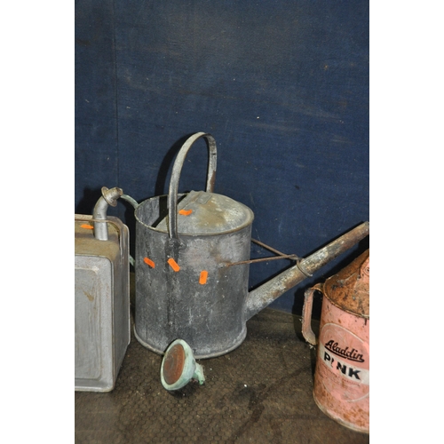 1051 - A COLLECTION OF VINTAGE FUEL CANS comprising of a Pratts petrol can with brass cap, an Aladdin Pink ... 