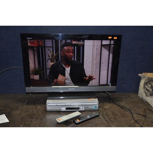 1053 - A SONY KDL 32EX403 32in TV with remote and a Sony DVD/Video recorder (DVD drawer closes as soon as i... 