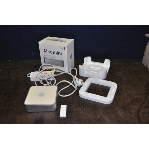 1055 - AN APPLE A 1176 MAC MINI marked 1.83/2x512/80/combo/ap/bt-gbr EMC No 2108 with power supply remote a... 