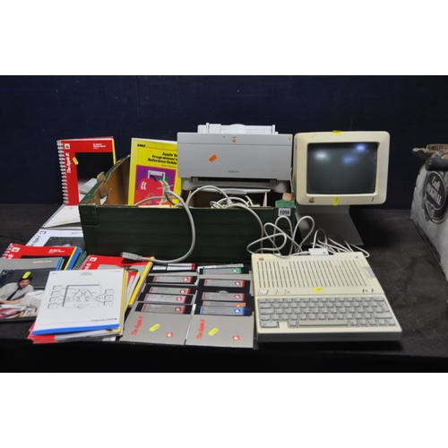 1056 - AN APPLE 2C PERSONAL COMPUTER (powers up but not tested any further) with power supply, a G092S moni... 