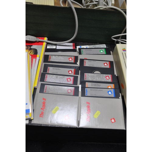 1056 - AN APPLE 2C PERSONAL COMPUTER (powers up but not tested any further) with power supply, a G092S moni... 