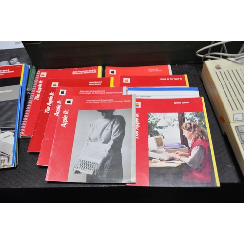 1056 - AN APPLE 2C PERSONAL COMPUTER (powers up but not tested any further) with power supply, a G092S moni... 