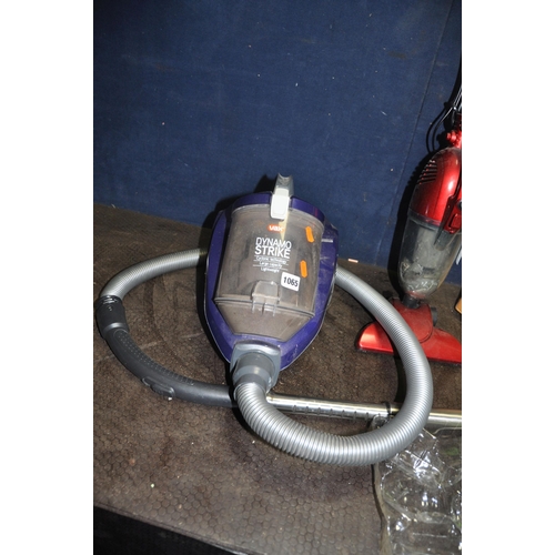 1065 - A VAX DYNAMO STRIKE VACUUM CLEANER, a Shenzhen wand vacuum cleaner and a JD Williams Cordless Spin S... 