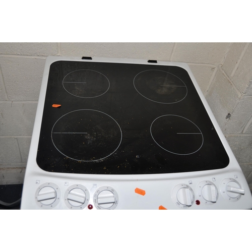 1103 - A ZANUSSI OVEN, with a ceramic hob, and two doors, width 55cm x depth 65cm x height 89cm (untested d... 