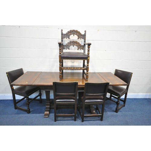 1199 - A REPRODUCTION OAK TRESTLE DRAW LEAF DINING TABLE, on square tapered legs, with foliate detailing, o... 