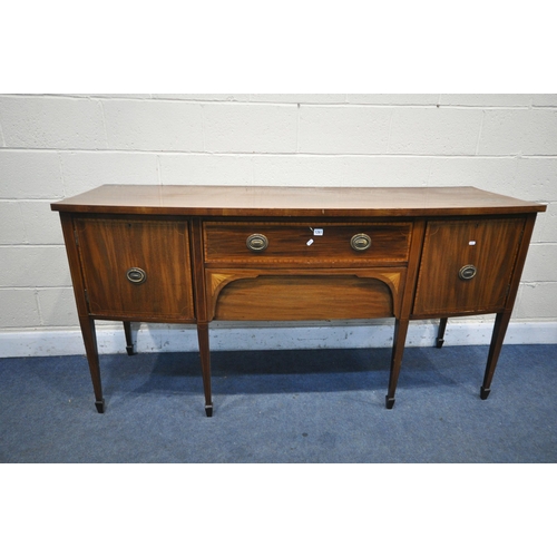 1200 - A DRUCE AND CO MAHOGANY AND INLAID BOW FRONT SIDEBOARD, with two cupboard doors, flanking two drawer... 