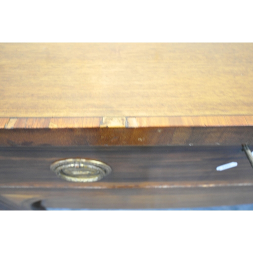 1200 - A DRUCE AND CO MAHOGANY AND INLAID BOW FRONT SIDEBOARD, with two cupboard doors, flanking two drawer... 