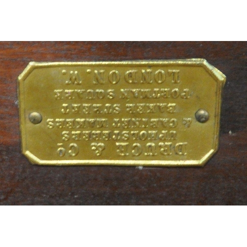 1200 - A DRUCE AND CO MAHOGANY AND INLAID BOW FRONT SIDEBOARD, with two cupboard doors, flanking two drawer... 