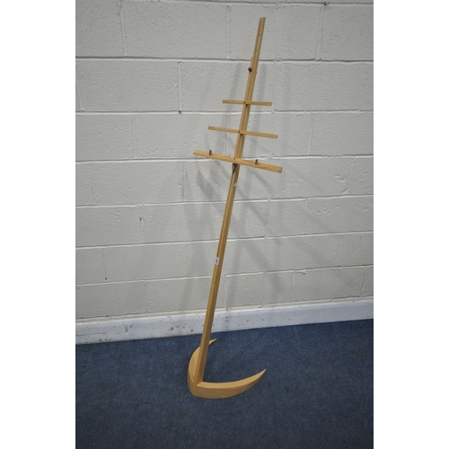 1201 - A BESPOKE MAPLE MUSIC STAND, with eight height levels, on a shaped base, height 167cm (condition - e... 