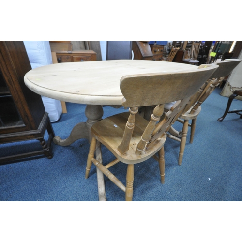 1256 - A PINE KITCHEN TABLE, with rounded ends, length 152cm x depth 98cm x height 74cm, and two beech chai... 