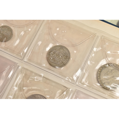 213 - A BOX CONTAINING SEVERAL ALBUMS OF COINS AND TOKENS, to include an album of approx. 80 x mostly 18th... 
