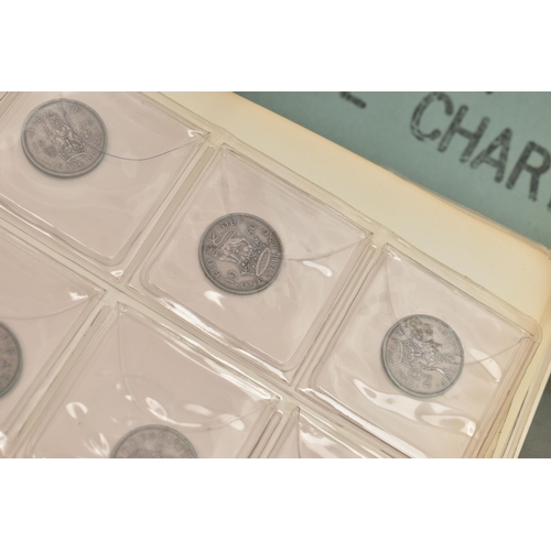 213 - A BOX CONTAINING SEVERAL ALBUMS OF COINS AND TOKENS, to include an album of approx. 80 x mostly 18th... 