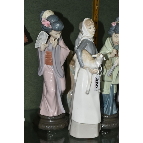 385 - A GROUP OF SIX LLADRO FIGURES,  comprising 4584 'Girl Holding Lamb', 4509 'Boy With Lambs' (missing ... 