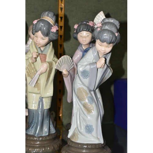 385 - A GROUP OF SIX LLADRO FIGURES,  comprising 4584 'Girl Holding Lamb', 4509 'Boy With Lambs' (missing ... 