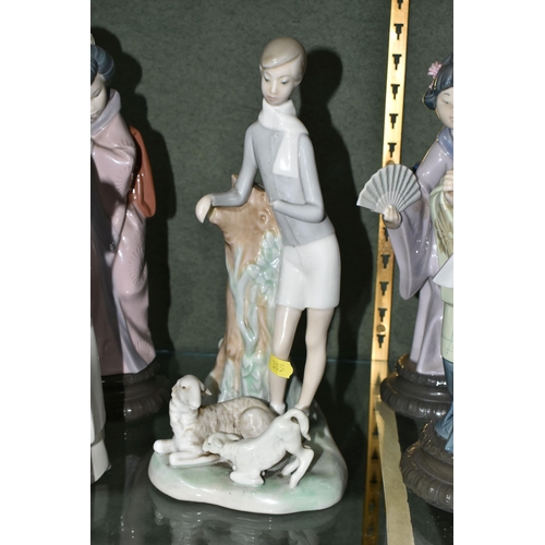 385 - A GROUP OF SIX LLADRO FIGURES,  comprising 4584 'Girl Holding Lamb', 4509 'Boy With Lambs' (missing ... 