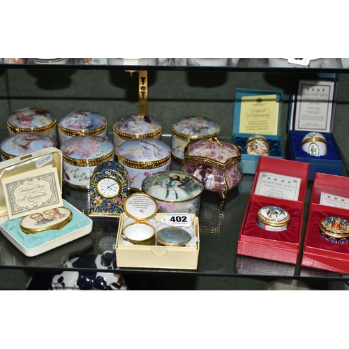 402 - A COLLECTION OF ENAMELLED PILL BOXES, seven boxed Halcyon Days pill boxes comprising 1996 Year of th... 