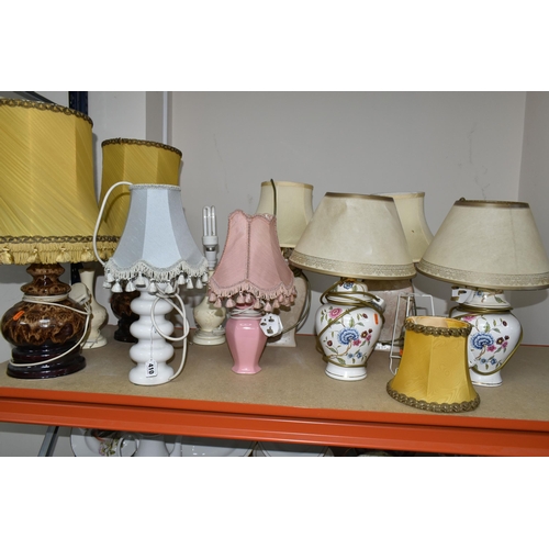 410 - TEN TABLE LAMPS, comprising a pair of beige floral lamps, a pair of floral Oriental style ginger jar... 