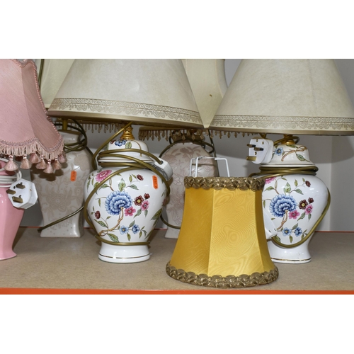 410 - TEN TABLE LAMPS, comprising a pair of beige floral lamps, a pair of floral Oriental style ginger jar... 
