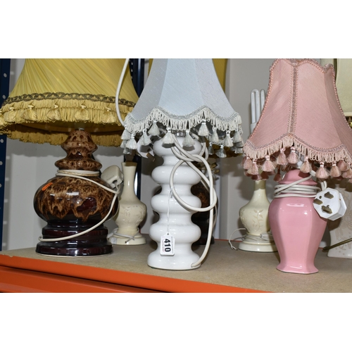 410 - TEN TABLE LAMPS, comprising a pair of beige floral lamps, a pair of floral Oriental style ginger jar... 