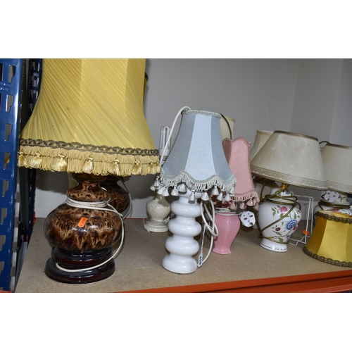 410 - TEN TABLE LAMPS, comprising a pair of beige floral lamps, a pair of floral Oriental style ginger jar... 