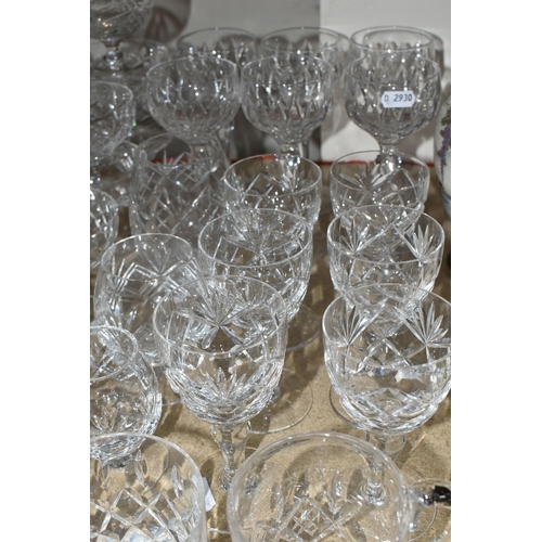 413 - A GROUP OF CRYSTAL GLASSWARE, comprising a pair of large Stuart Crystal -Jasper Conran wine glasses,... 