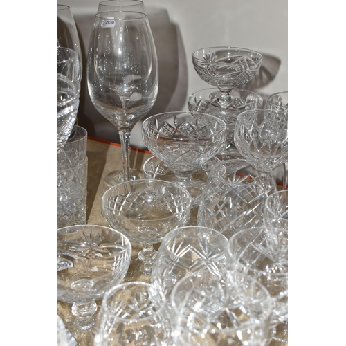 413 - A GROUP OF CRYSTAL GLASSWARE, comprising a pair of large Stuart Crystal -Jasper Conran wine glasses,... 