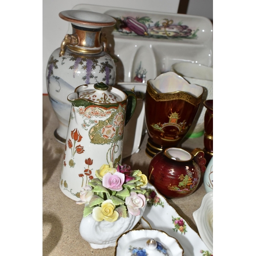 414 - A GROUP OF 20TH CENTURY CERAMICS, comprising a Clarice Cliff Newport pottery ribbed, floral design d... 