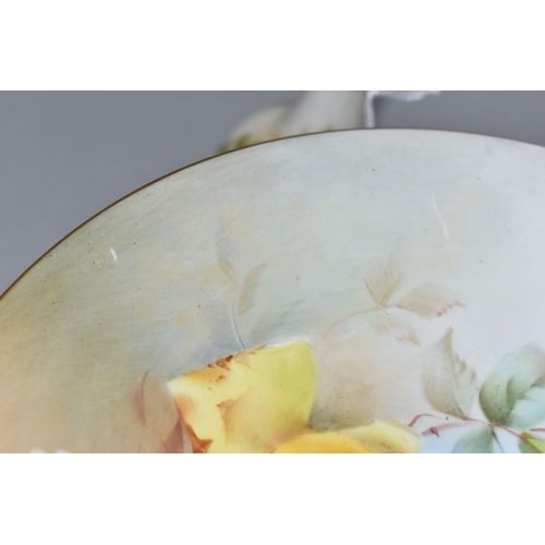 624 - THREE PIECES OF ROYAL WORCESTER PORCELAIN, comprising a comport painted with roses, iron red no. W 6... 