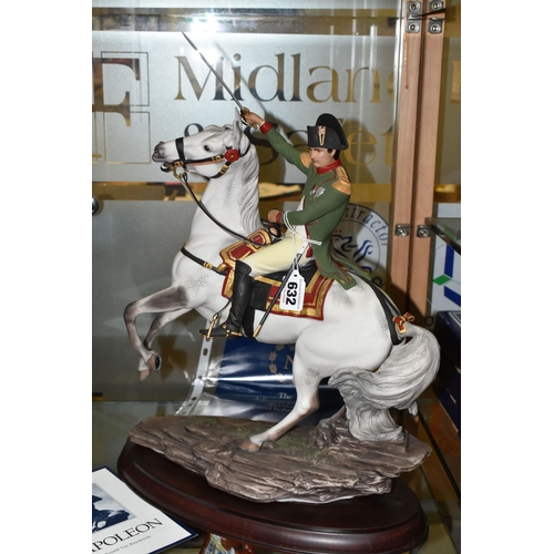 632 - A FRANKLIN MINT PORCELAIN FIGURE 'NAPOLEON', designed by Ronald Van Ruyckevelt, mounted on a wooden ... 