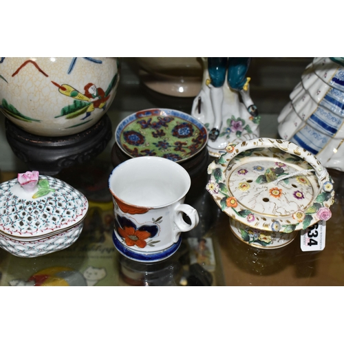 634 - A GROUP OF 19TH AND 20TH CENTURY CERAMICS, including a Coalbrookdale pot pourri and cover of floral ... 