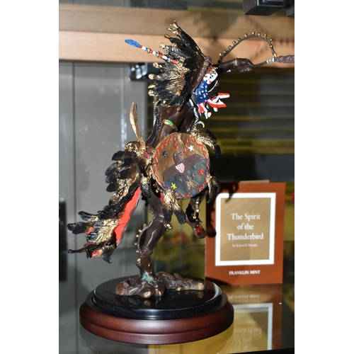 637 - A BOXED FRANKLIN MINT 'SPIRIT OF THE THUNDERBIRD' BRONZE SCULPTURE, after Robert F Murphy, depicting... 