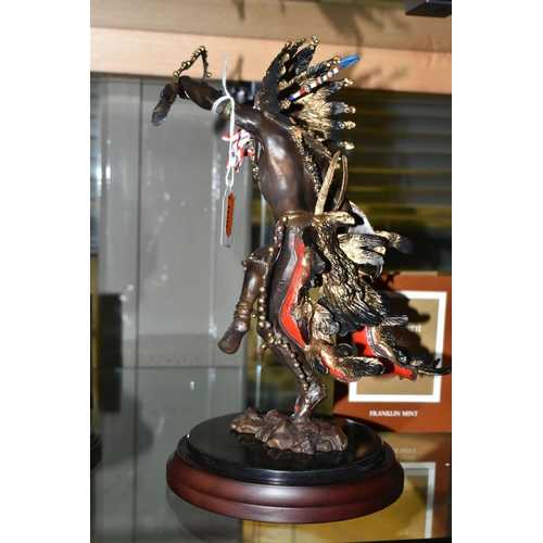 637 - A BOXED FRANKLIN MINT 'SPIRIT OF THE THUNDERBIRD' BRONZE SCULPTURE, after Robert F Murphy, depicting... 