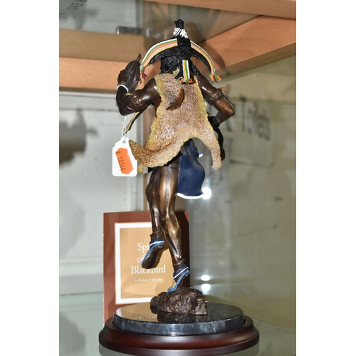 647 - A BOXED FRANKLIN MINT 'SPIRIT OF THE BLACKBIRD' BRONZE SCULPTURE, after Robert F Murphy, depicting a... 