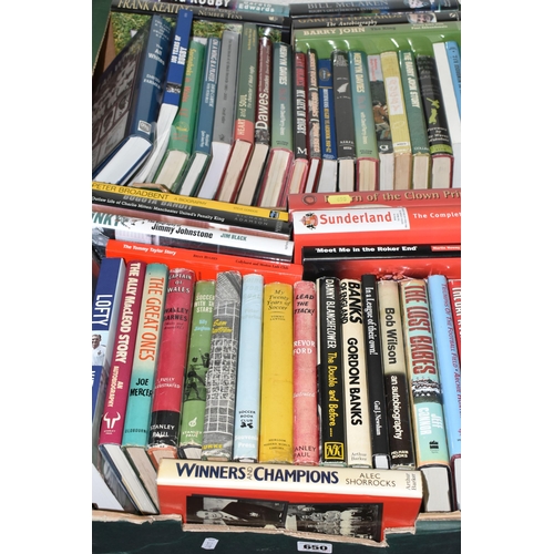 650 - TWO BOXES OF BOOKS containing fifty-four titles mostly in hardback format (48) and concerning Footba... 