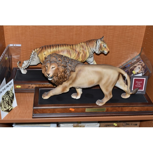 680 - TWO FRANKLIN MINT HAND PAINTED PORCELAIN BIG CATS, comprising a Lion 'Monarch of the Serengeti' appr... 