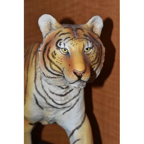 680 - TWO FRANKLIN MINT HAND PAINTED PORCELAIN BIG CATS, comprising a Lion 'Monarch of the Serengeti' appr... 